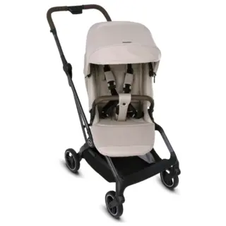 Beige baby stroller with canopy and 5-point harness on a black frame, standing on a white background.