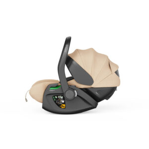 Infant car seat with beige fabric mounted on a gray base, handle raised, part of a travel system.