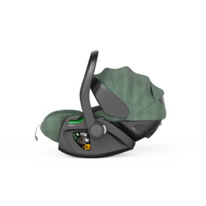Infant car seat with base in dark gray and green fabric canopy extended, handle raised to the side.
