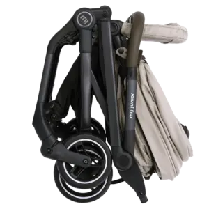 Folded baby stroller with beige fabric and black frame, compact for storage.
