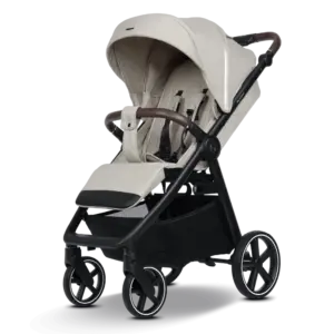 Beige baby stroller with a canopy, brown handles, and a lower storage basket under a black frame.