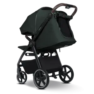 Dark green baby stroller with a large canopy, brown handlebar, and roomy basket beneath; four wheels and a compact foldable frame.