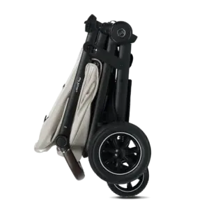 Folded black stroller with beige fabric seat, compact and travel-ready with visible wheels and folded frame.