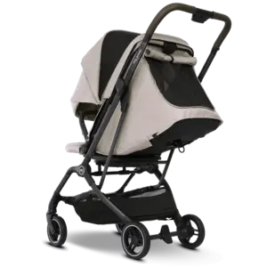 Baby stroller in beige and black with a folding canopy and large wheels, shown in a side view