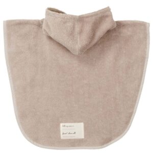 Beige hooded towel poncho with curved bottom edges, laid flat view, label on front pocket area