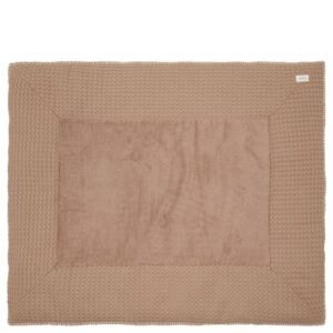 Beige square bath mat with a textured waffle border and a small tag in the top-right corner.