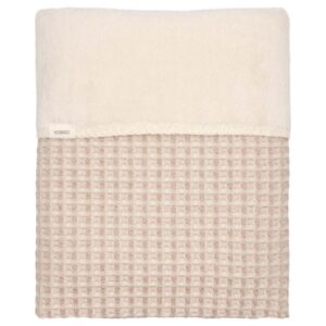 Cream towel with a cream top border and a beige waffle-textured body, visible Koeka tag on the seam.