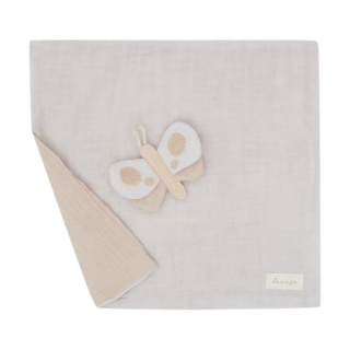 Soft light-gray baby blanket with a beige butterfly appliqué and folded corner, brand tag visible bottom-right.
