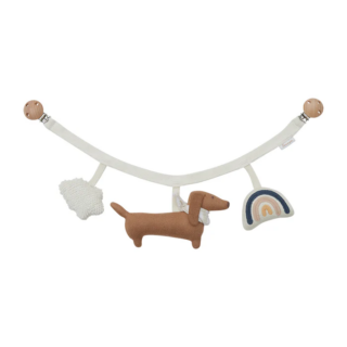 Soft baby garland with a brown dachshund plush, knit cloud, and rainbow hanging from a curved fabric arch with wooden ends.