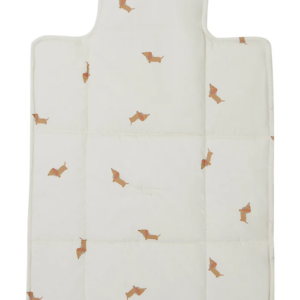 White apron with a repeating pattern of small brown dachshund dogs across its surface.