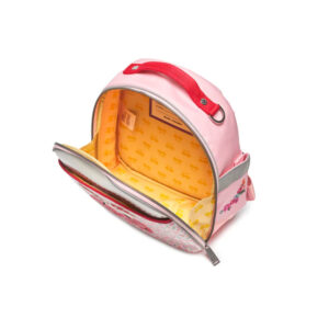 Pink kids' backpack unzipped to show the yellow patterned interior and front pocket with a red handle accessory on top.