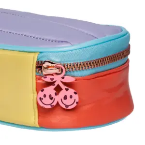 Close-up of a colorful zippered pouch with a pink heart-shaped zipper pull featuring smiling faces.