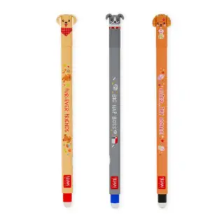 Three novelty pens with dog-headed toppers in beige, gray, and orange, each with playful phrases along the bodies and small decorative icons.