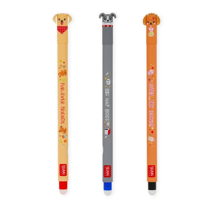 Three novelty pens with dog-headed toppers in beige, gray, and orange, each with playful phrases along the bodies and small decorative icons.
