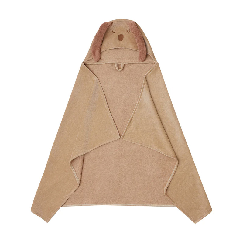 leevjehundhandtuch Beige children's hooded blanket poncho with a dog-face hood and floppy ears, laid flat.